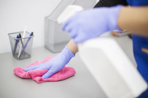 Commercial cleaner working in a Brent office reception area