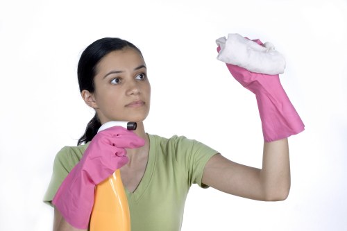 Cleaner working in a Brent property with access and parking considerations