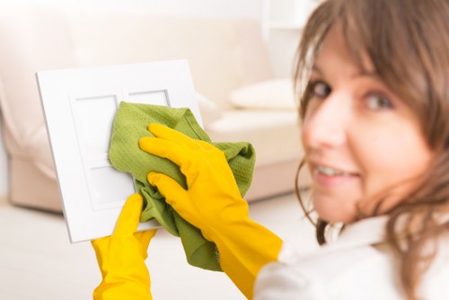 Cleaners maintaining a tidy and hazard-free workspace